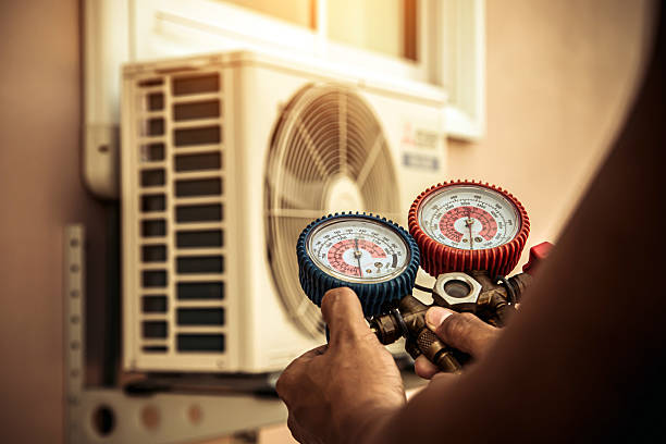 Professional Hvac technician working in Chester, WV